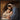 Gabriel Heaton painting of Joseph and Mary cradling the newborn baby Jesus in a warm, intimate nativity scene