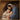 Gabriel Heaton painting of Joseph and Mary cradling the newborn baby Jesus in a warm, intimate nativity scene