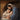 Gabriel Heaton painting of Joseph and Mary cradling the newborn baby Jesus in a warm, intimate nativity scene