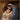 Gabriel Heaton painting of Joseph and Mary cradling the newborn baby Jesus in a warm, intimate nativity scene