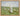 Gabriel Heaton painting of Jesus Christ as the Good Shepherd standing in a green meadow holding a staff with a flock of white sheep in the background