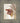 Gabriel Heaton painting of the outstretched nail-scarred hand of Jesus Christ in white robes reaching toward the viewer