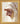 Gabriel Heaton painting of the outstretched nail-scarred hand of Jesus Christ in white robes reaching toward the viewer