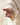 Gabriel Heaton painting of the outstretched nail-scarred hand of Jesus Christ in white robes reaching toward the viewer