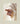 Gabriel Heaton painting of the outstretched nail-scarred hand of Jesus Christ in white robes reaching toward the viewer