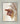 Gabriel Heaton painting of the outstretched nail-scarred hand of Jesus Christ in white robes reaching toward the viewer