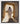 Gabriel Heaton painting of Jesus Christ in white robes standing in the doorway of the empty tomb looking out into bright light beyond the stone archway