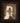 Gabriel Heaton painting of Jesus Christ in white robes standing in the doorway of the empty tomb looking out into bright light beyond the stone archway