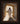 Gabriel Heaton painting of Jesus Christ in white robes standing in the doorway of the empty tomb looking out into bright light beyond the stone archway