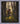 Gabriel Heaton painting of Moroni kneeling in prayer in a forest with his sword planted in the ground and rays of light filtering through the trees