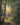 Gabriel Heaton painting of a sunlit forest path with golden light streaming through tall trees creating a luminous heavenly atmosphere
