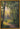 Gabriel Heaton painting of a sunlit forest path with golden light streaming through tall trees creating a luminous heavenly atmosphere
