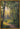 Gabriel Heaton painting of a sunlit forest path with golden light streaming through tall trees creating a luminous heavenly atmosphere