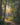 Gabriel Heaton painting of a sunlit forest path with golden light streaming through tall trees creating a luminous heavenly atmosphere