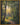 Gabriel Heaton painting of a sunlit forest path with golden light streaming through tall trees creating a luminous heavenly atmosphere