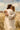 Gabriel Heaton painting of Jesus Christ embracing a young woman in white robes in a golden wheat field
