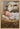 Gabriel Heaton painting of the baby Jesus sleeping in a golden straw manger with a white lamb resting beside him in soft warm light