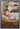 Gabriel Heaton painting of the baby Jesus sleeping in a golden straw manger with a white lamb resting beside him in soft warm light