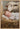 Gabriel Heaton painting of the baby Jesus sleeping in a golden straw manger with a white lamb resting beside him in soft warm light