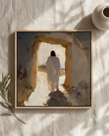 He Is Risen Christian wall art by Gabriel Heaton in a natural wood float frame, styled flat lay on neutral linen