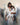 Jesus Christ tenderly holding a young girl resting against His shoulder
