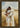 Arms of Mercy, 32 × 48, Plein Air Economy Espresso Gold Frame — framed canvas mockup [statement-preview]