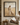 Stay with the Shepherd framed Christian canvas wall art beside a woman reading