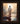 Gabriel Heaton painting of Jesus Christ seen from behind walking into brilliant white light reflected in calm water surrounded by dramatic clouds