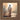 Gabriel Heaton painting of Jesus Christ seen from behind walking into brilliant white light reflected in calm water surrounded by dramatic clouds