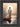 Gabriel Heaton painting of Jesus Christ seen from behind walking into brilliant white light reflected in calm water surrounded by dramatic clouds