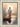Gabriel Heaton painting of Jesus Christ seen from behind walking into brilliant white light reflected in calm water surrounded by dramatic clouds