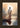 Gabriel Heaton painting of Jesus Christ seen from behind walking into brilliant white light reflected in calm water surrounded by dramatic clouds