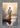 Gabriel Heaton painting of Jesus Christ seen from behind walking into brilliant white light reflected in calm water surrounded by dramatic clouds