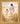 Gabriel Heaton painting of Jesus Christ in white robes walking hand in hand with a young girl through a golden wheat field