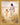 Gabriel Heaton painting of Jesus Christ in white robes walking hand in hand with a young girl through a golden wheat field