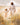 Gabriel Heaton painting of Jesus Christ in white robes walking hand in hand with a young girl through a golden wheat field