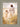 Gabriel Heaton painting of Jesus Christ in white robes walking hand in hand with a young girl through a golden wheat field
