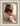 Gabriel Heaton's 'The Good Shepherd' Christian art of Jesus Christ looking to the side, holding a white lamb.