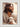 Gabriel Heaton's 'The Good Shepherd' Christian art of Jesus Christ looking to the side, holding a white lamb.