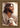 Gabriel Heaton's 'The Good Shepherd' Christian art of Jesus Christ looking to the side, holding a white lamb.