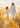 Gabriel Heaton painting of Jesus Christ in white robes walking through a golden wheat field with two young girls following closely behind him