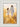 Gabriel Heaton painting of Jesus Christ in white robes walking through a golden wheat field with two young girls following closely behind him