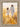Gabriel Heaton painting of Jesus Christ in white robes walking through a golden wheat field with two young girls following closely behind him