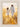 Gabriel Heaton painting of Jesus Christ in white robes walking through a golden wheat field with two young girls following closely behind him