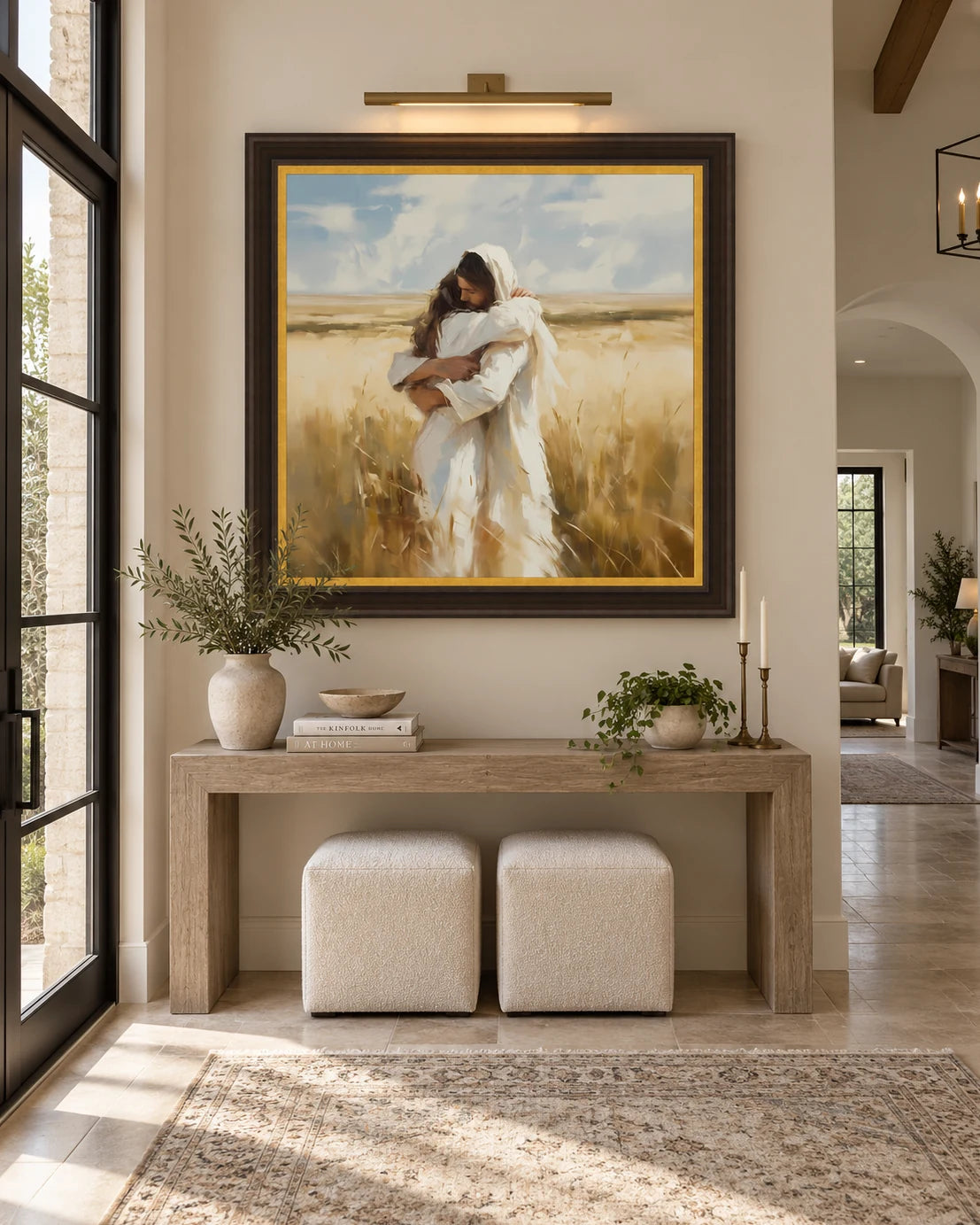 Large Arms of Mercy statement artwork displayed in an elegant entryway