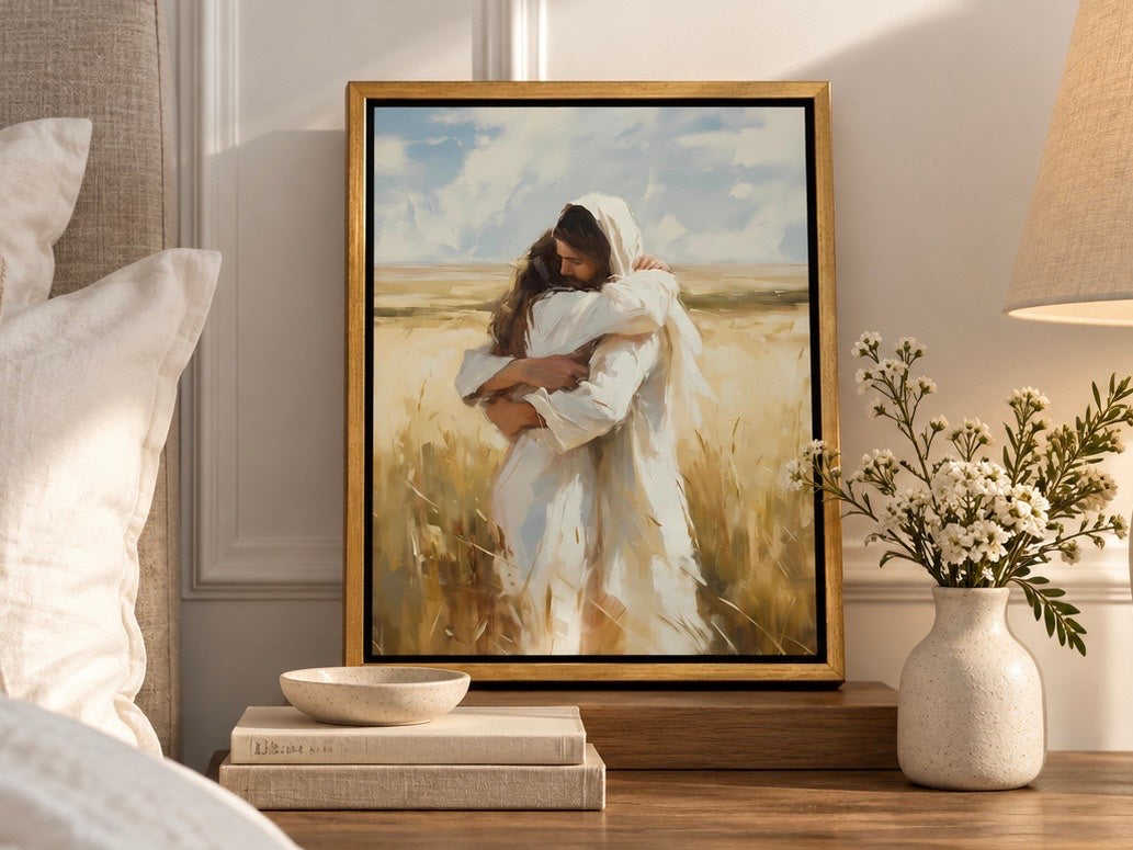 Arms of Mercy in a gold float frame displayed on a warm bedroom nightstand